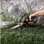 Cisailles pivotantes sur 300 degrés pour le gazon